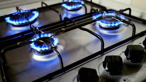 blue flames from gas stove